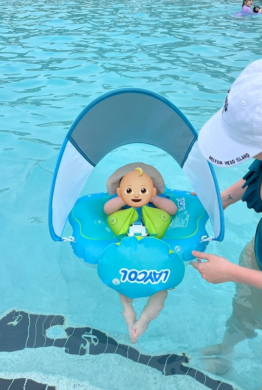 Disney with a newborn: baby in swim float